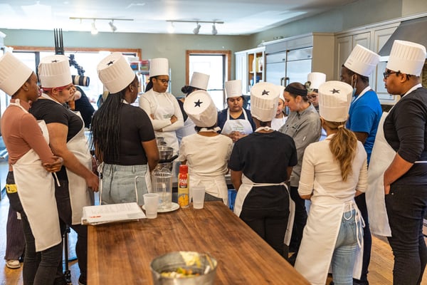 Lisa Surrounded by Students