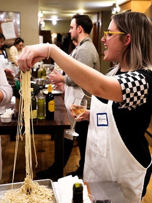 3x4-woman-making-homemade-noodles-drinking-wine