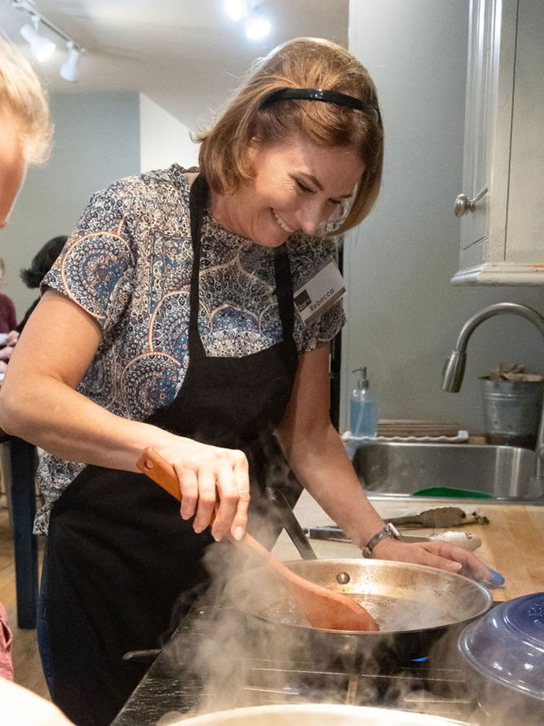 3x4-woman-making-sauce-over-hot-pan