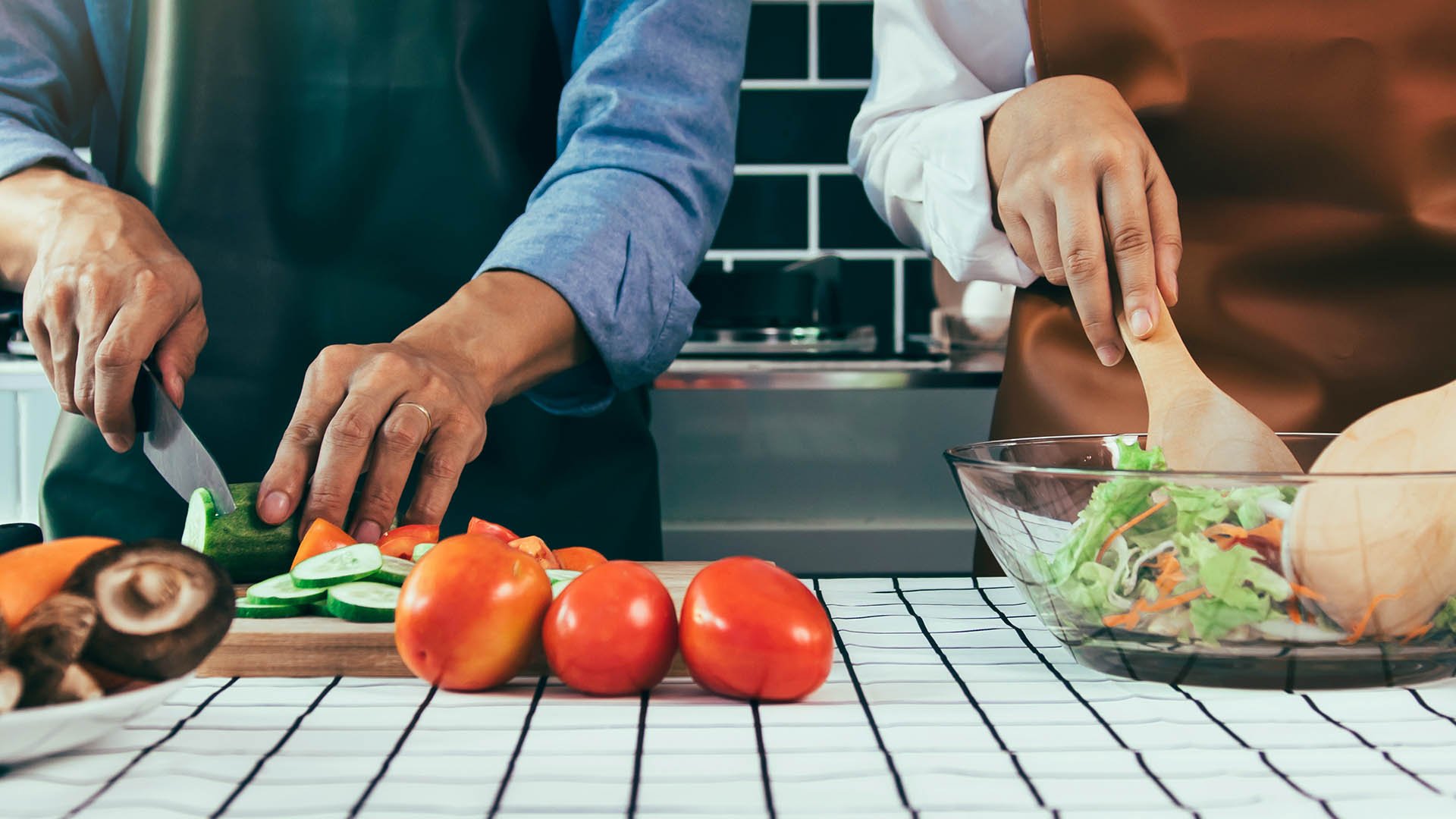 16x9-hands-prepping-meal