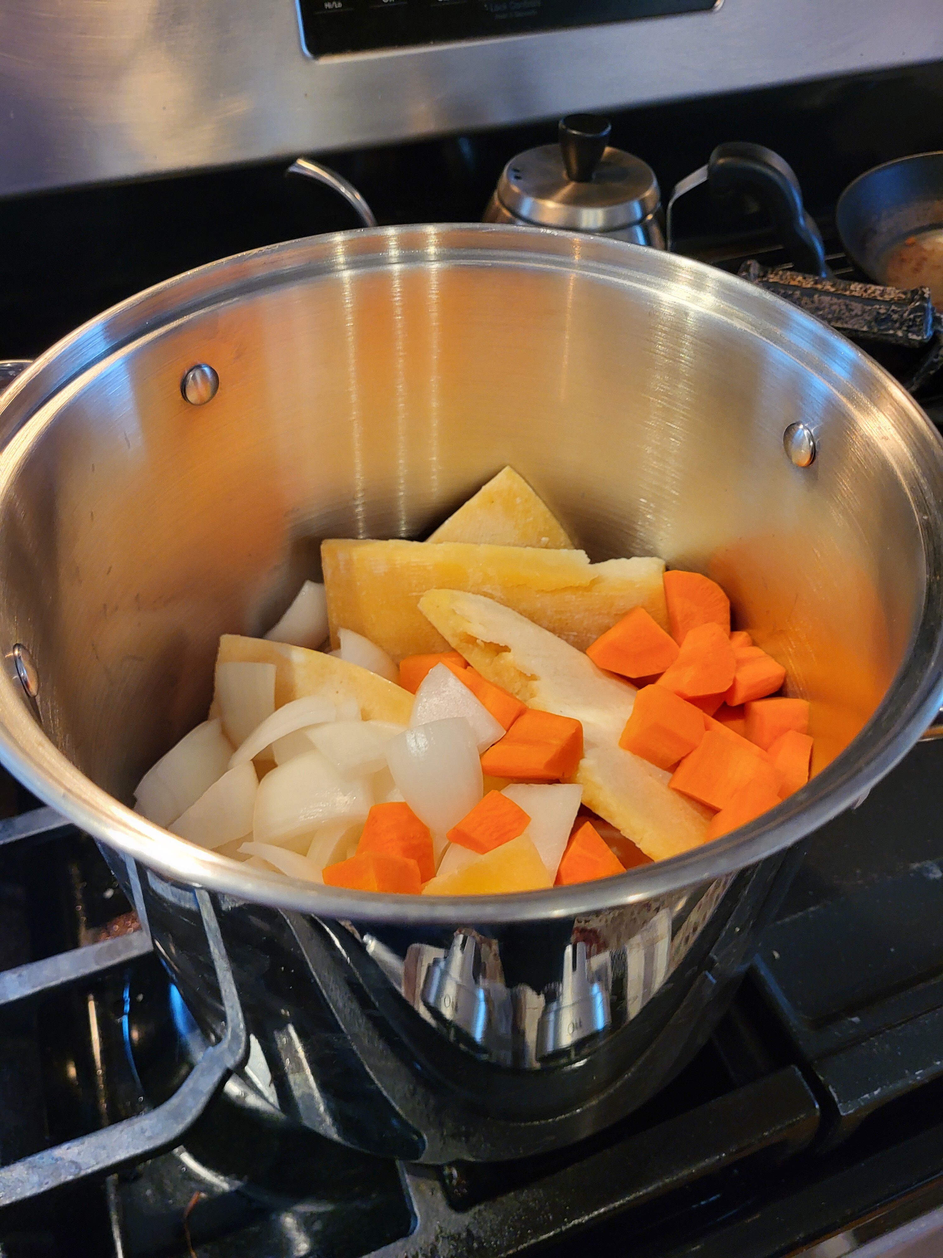 Veggies and rinds in pot