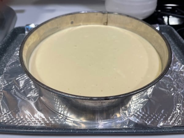 Cheesecake batter in pan