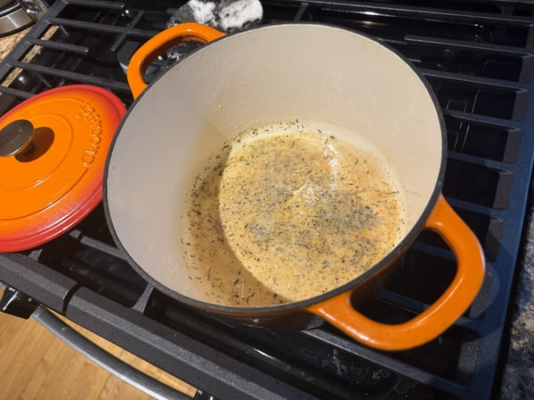 Butter and herbs in pot