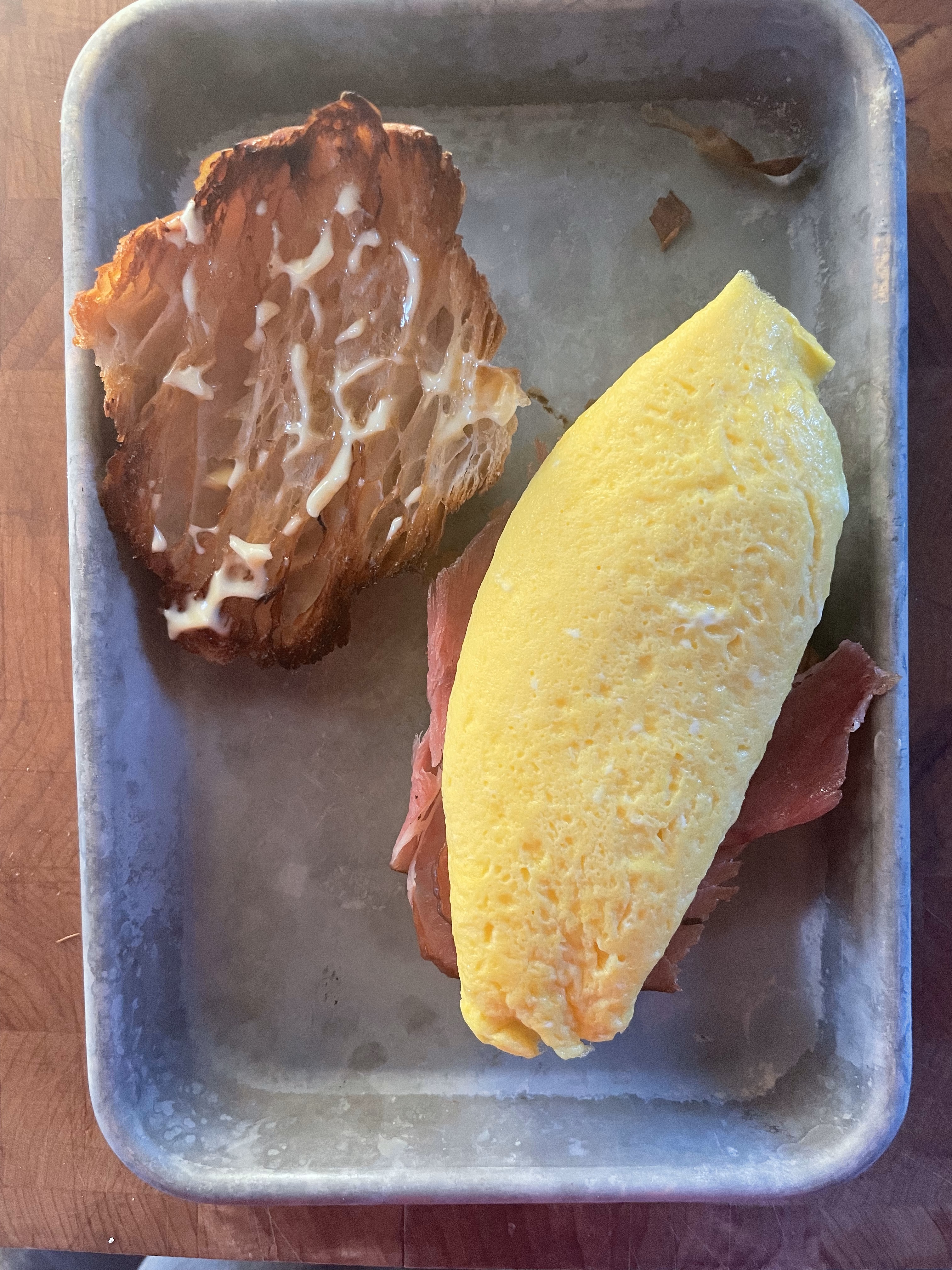 Assembling breakfast sandwich