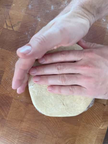 Hands on dough