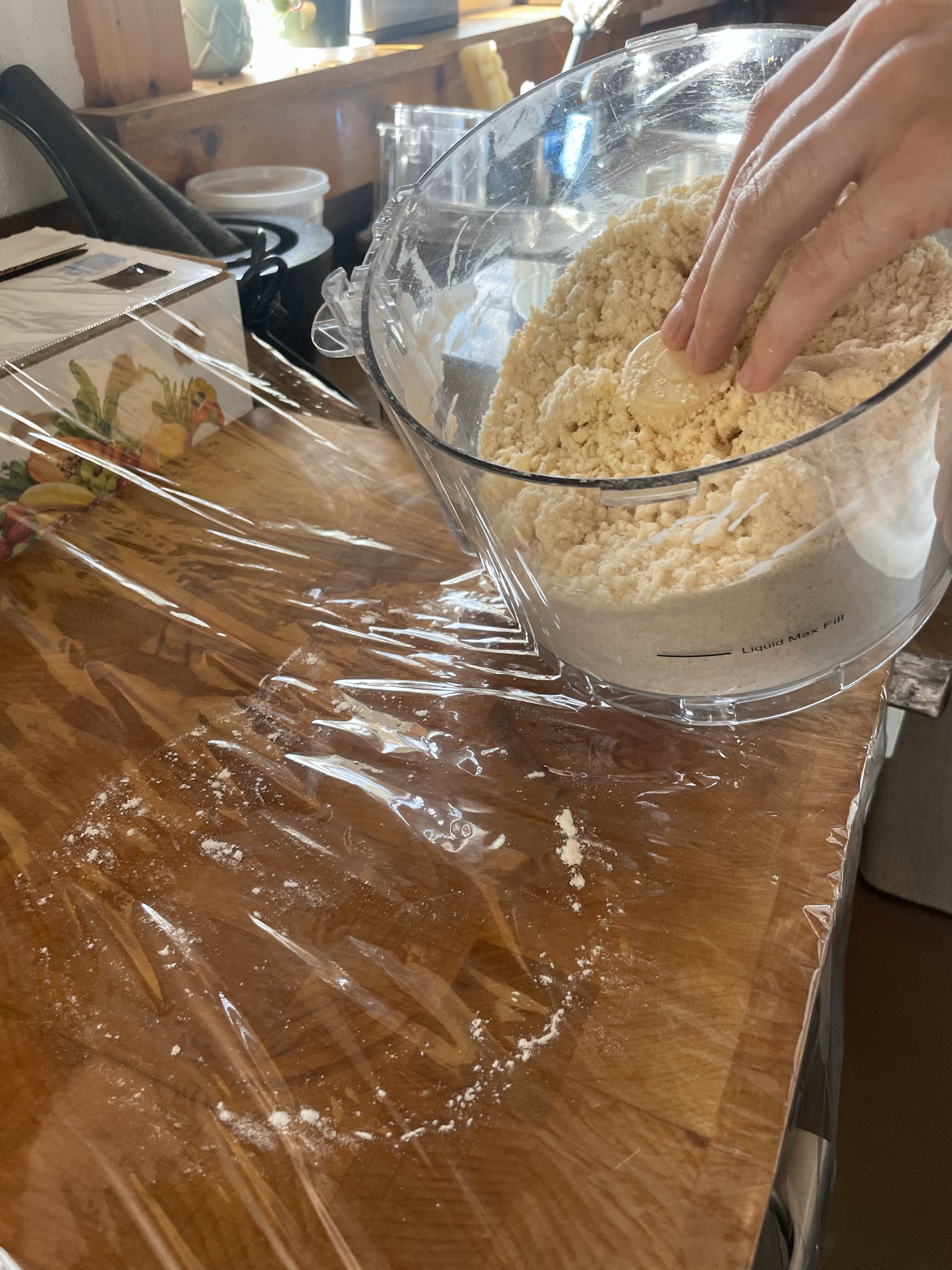 Dumping dough onto plastic