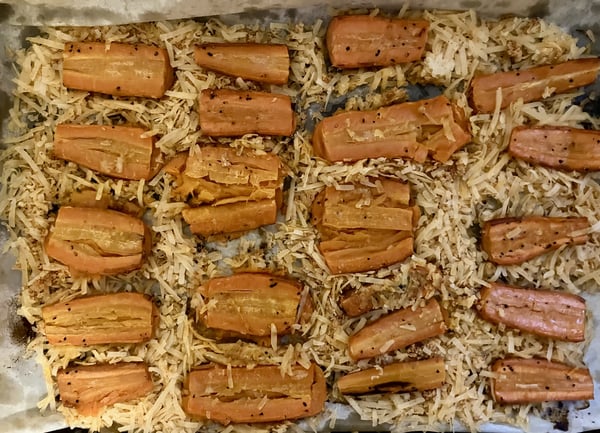 Carrots on pan with cheese