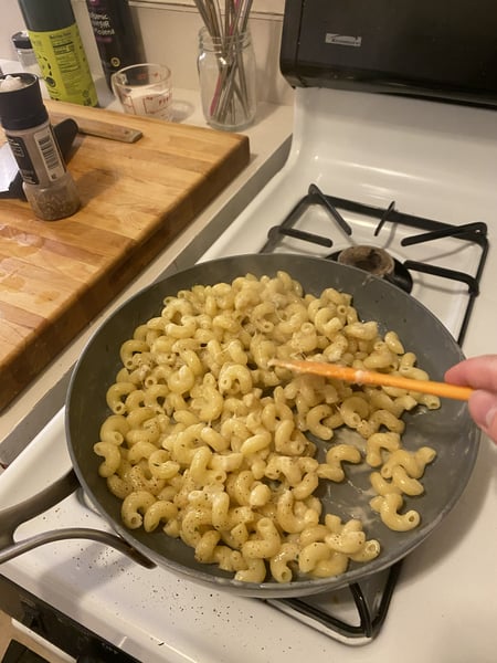 Cheese and butter into pasta