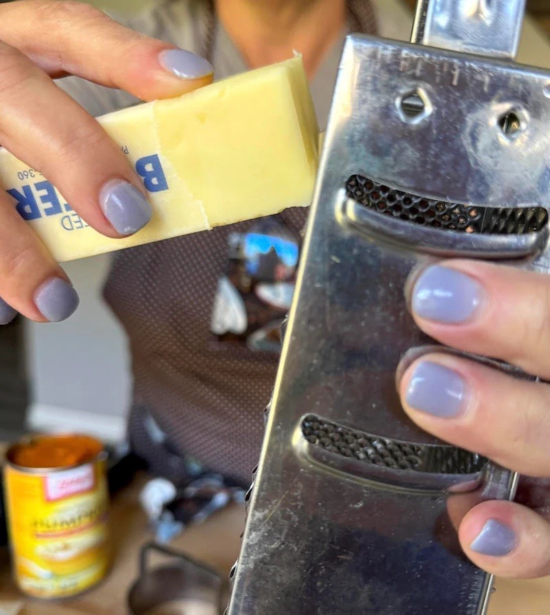 Grate cold butter