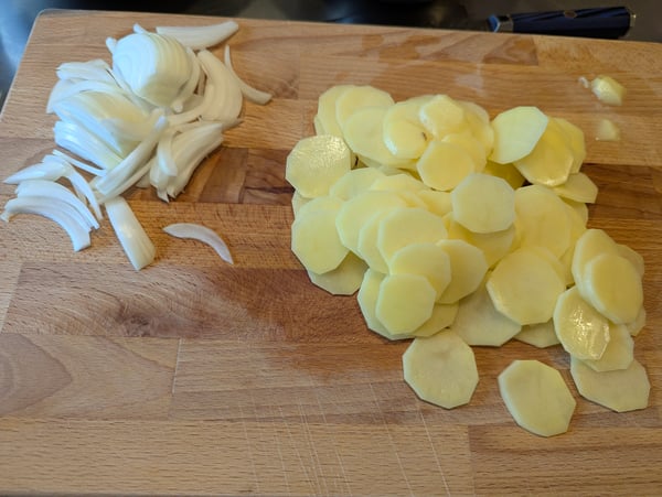 Sliced onions and potatoes