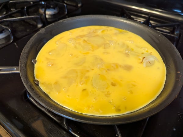 Eggs over potato mixture