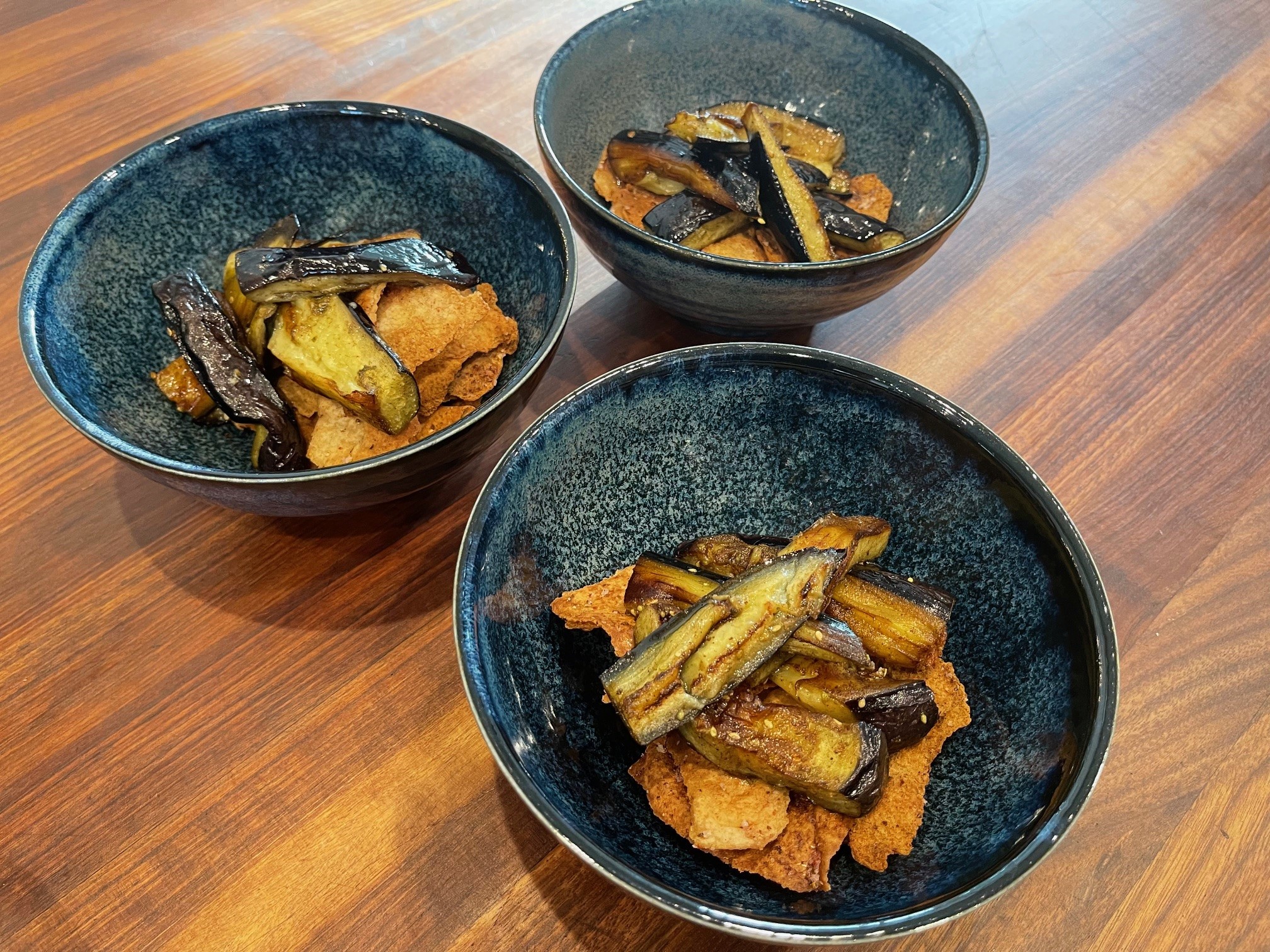 Eggplant and pita in bowl