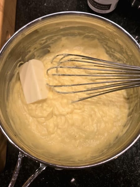 Adding butter to pastry cream