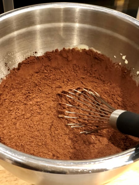 addition of cocoa powder before whisking