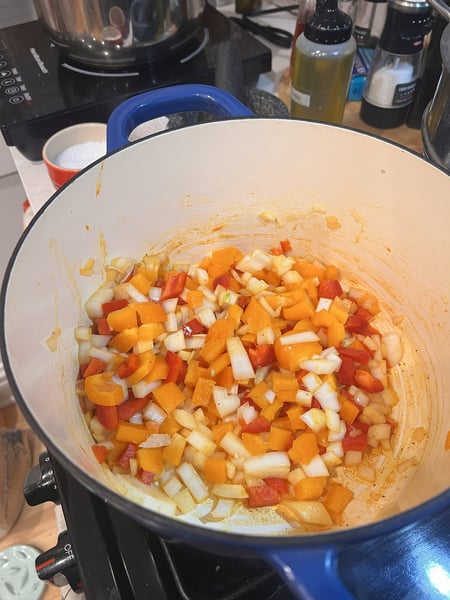 Vegetables added to pot