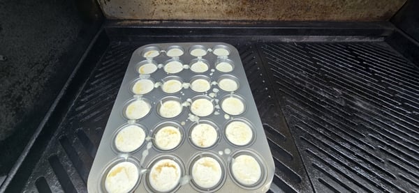 Baking muffin tin on grill