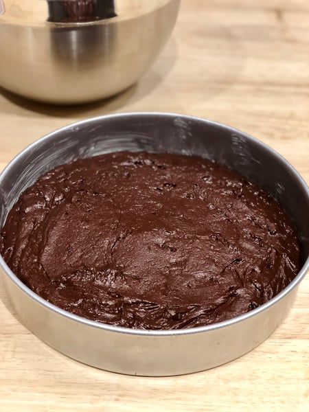 batter in pan, leveled with offset spatula