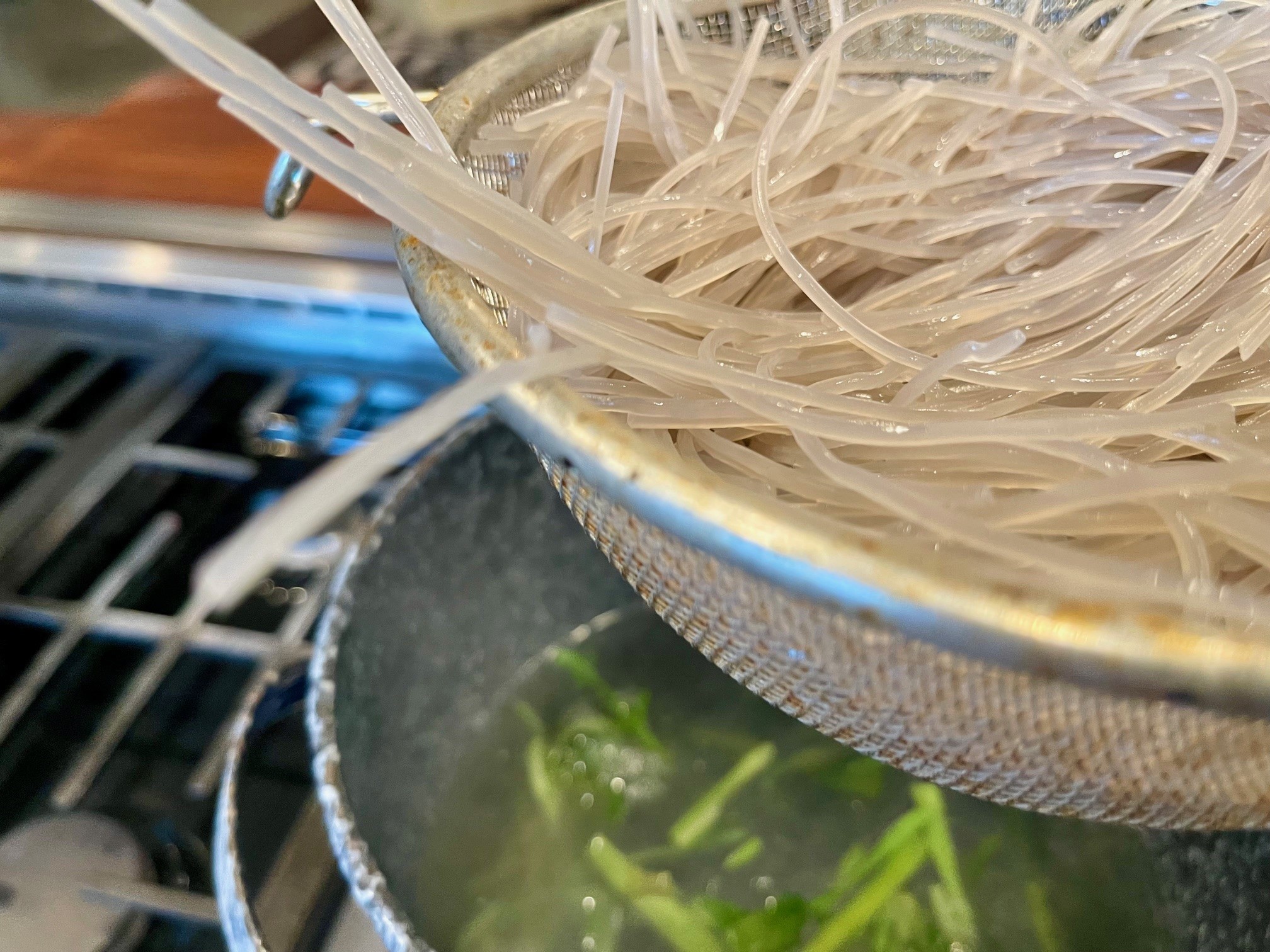 Boiling noodles and broccoli