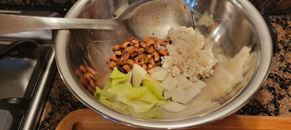 bowl with rice beans cabbage