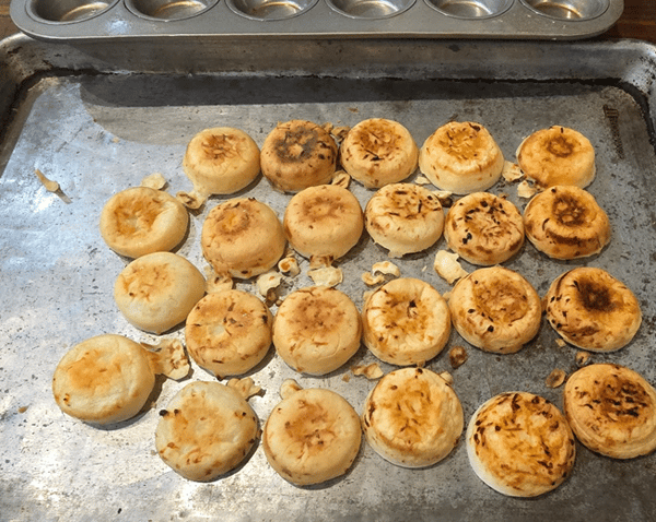 Brazilian cheese bread on sheet tray