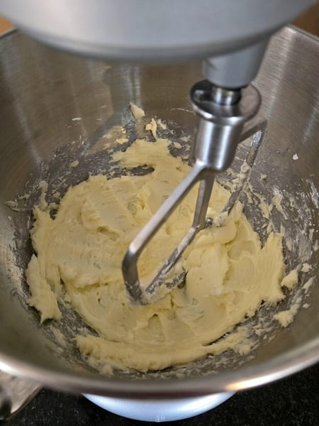 Cream butter and powdered sugar