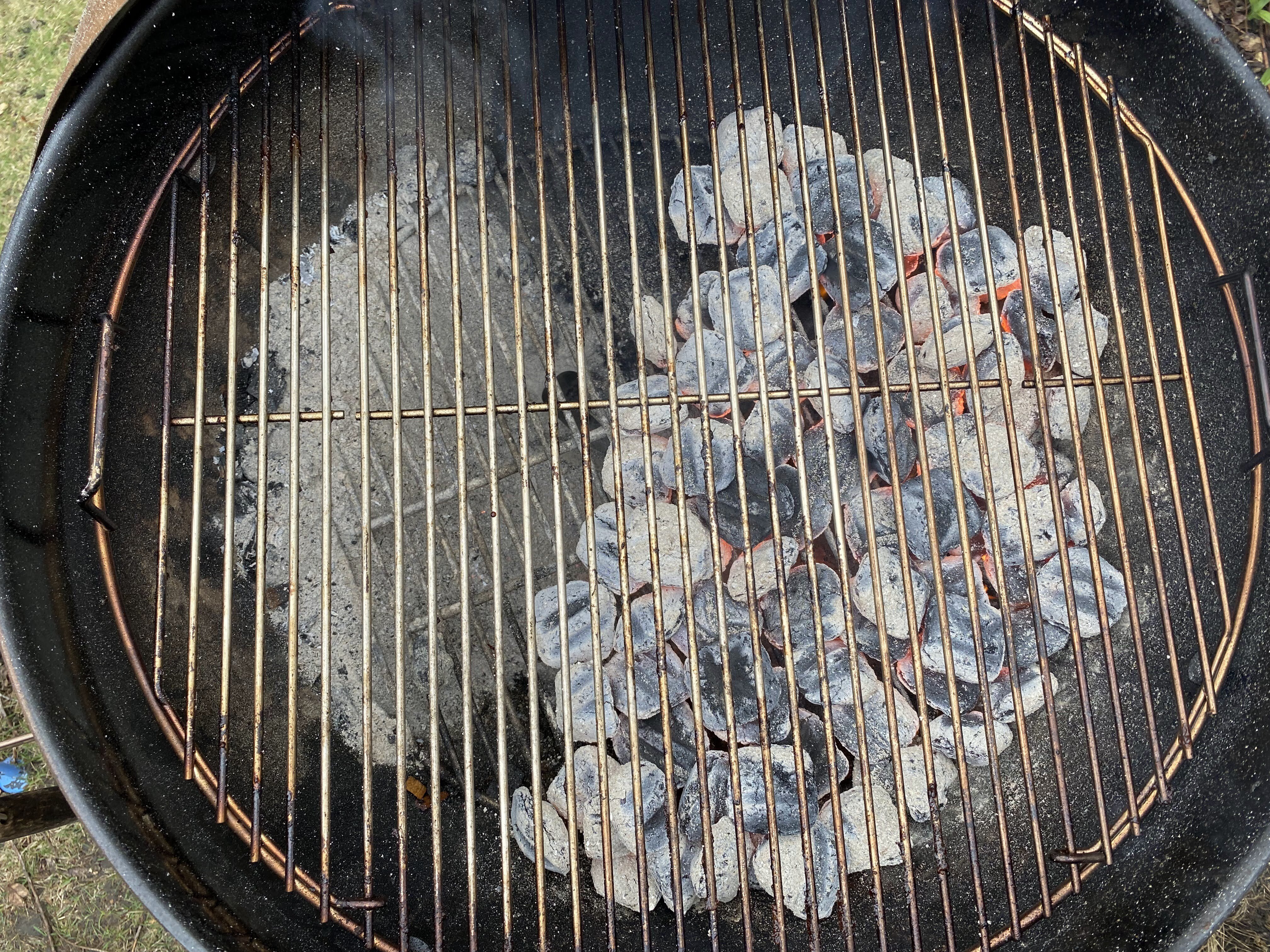 Charcoal on one side of grill
