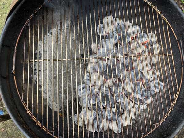 Charcoal on one side of grill