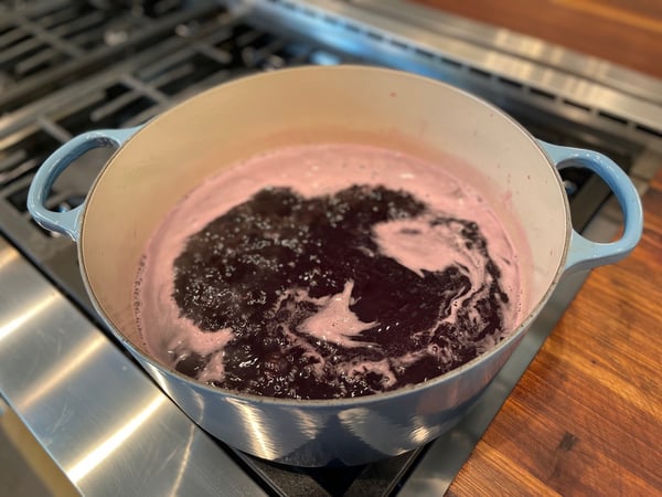 cherry liquid coming to a boil