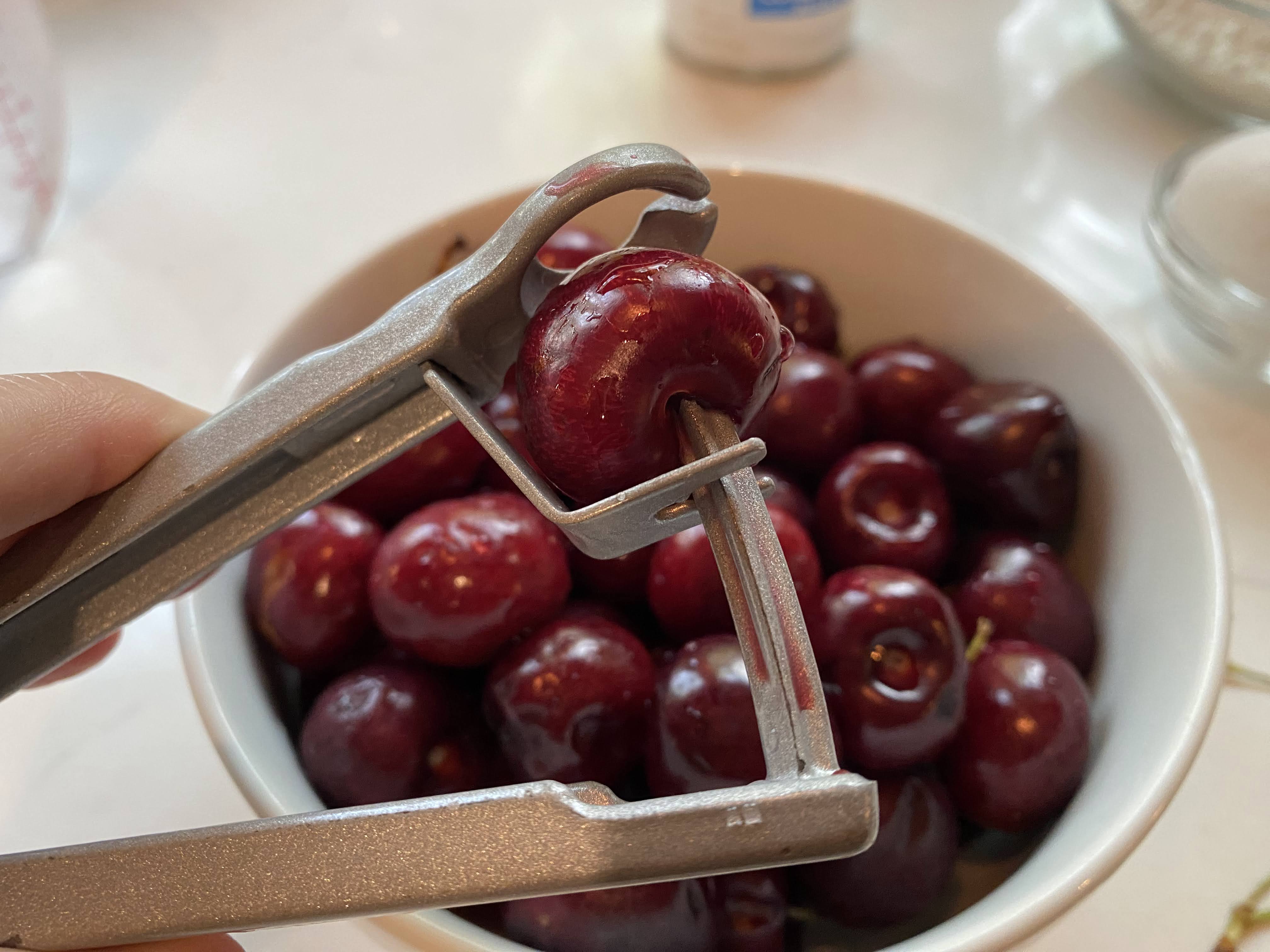 Cherry in cherry pitter