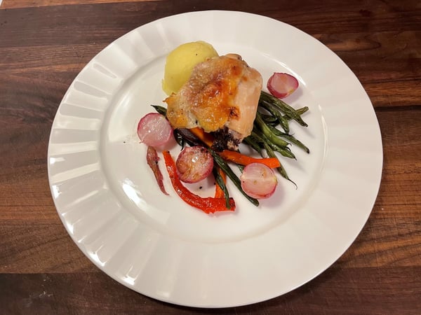 chicken vegetables and potatoes plated