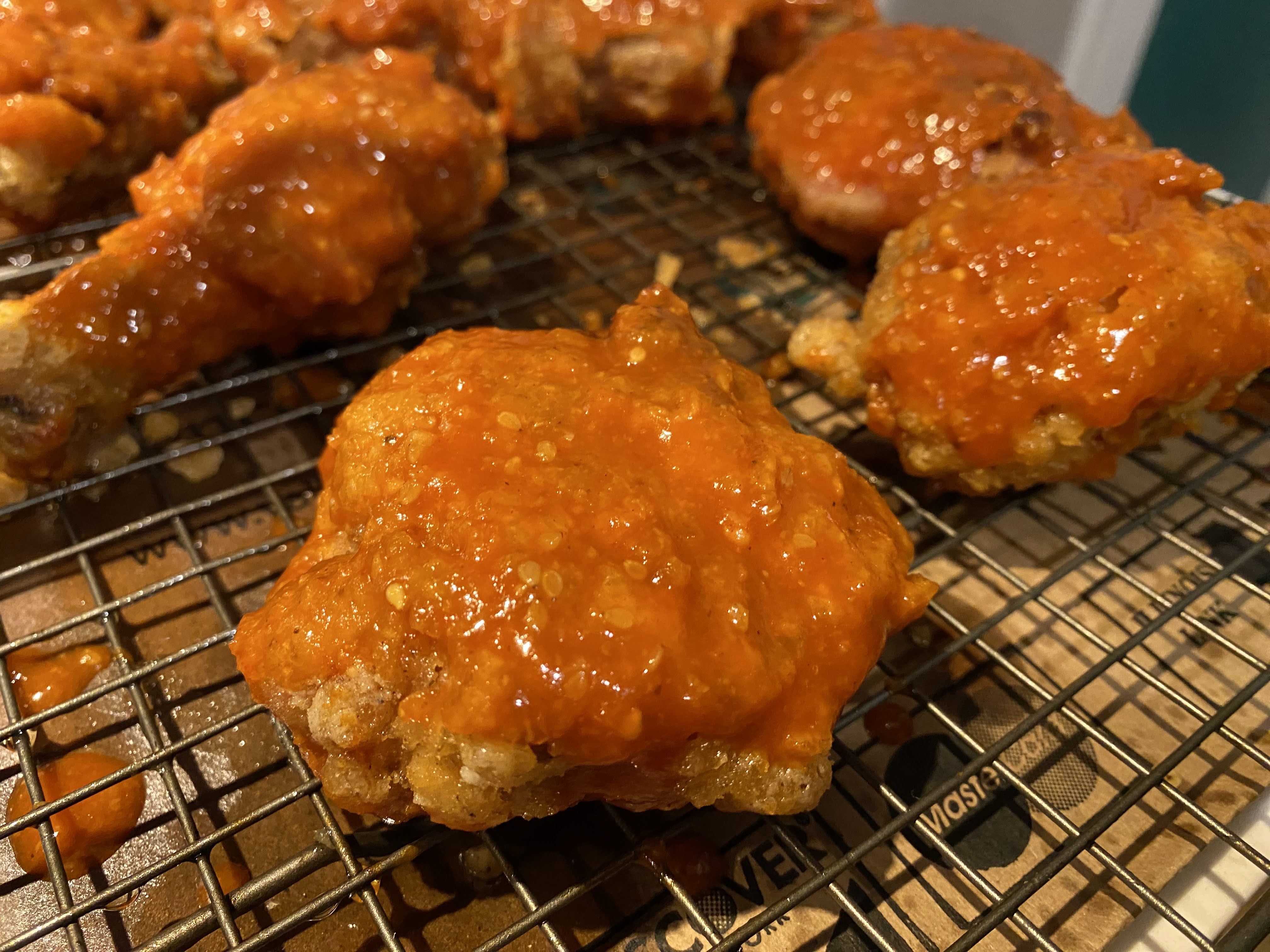 Chicken with sauce on rack