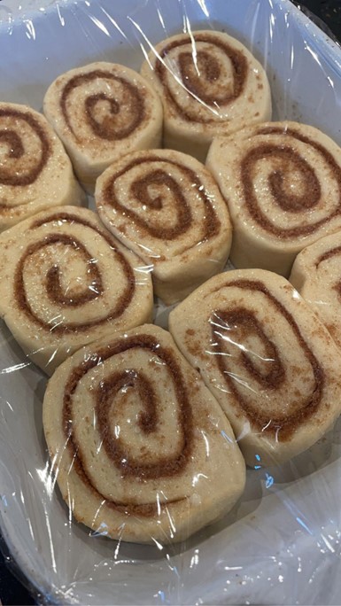 cinnamon rolls covered in plastic