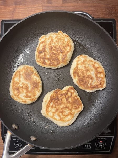 Pancakes cooking other side