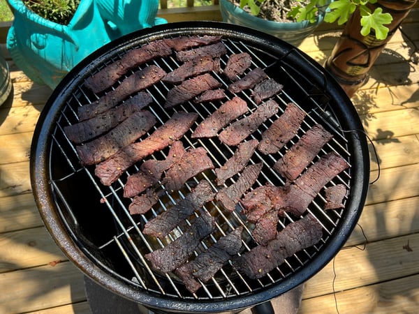 cooked meat on smoker