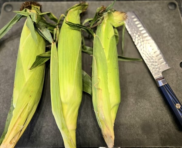 Corn with knife