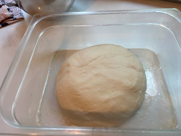 Dough ball in plastic container