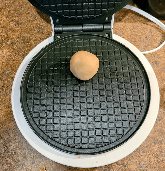 dough ball in waffle maker