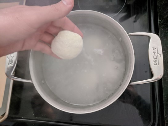 dough into water