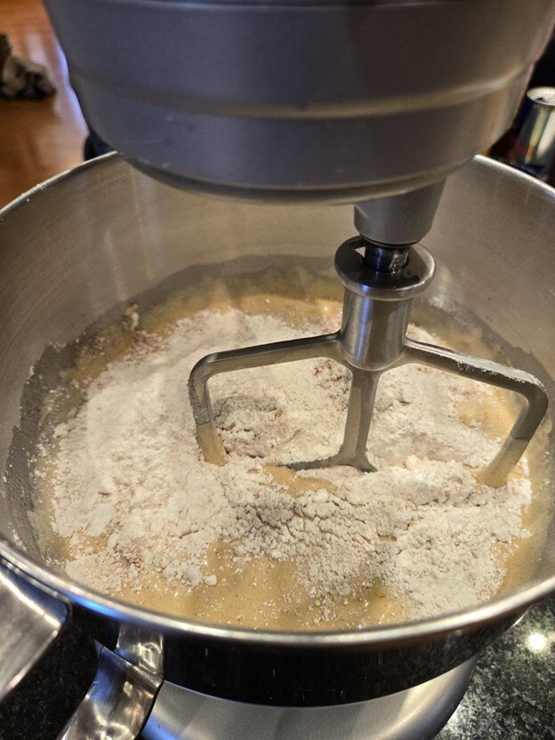 Dry ingredients into batter