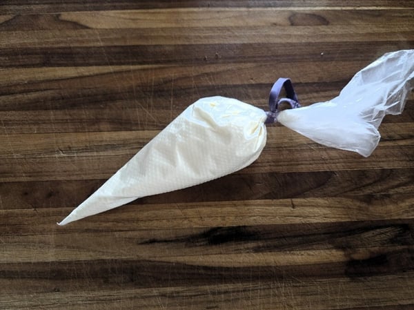 Filled piping bag