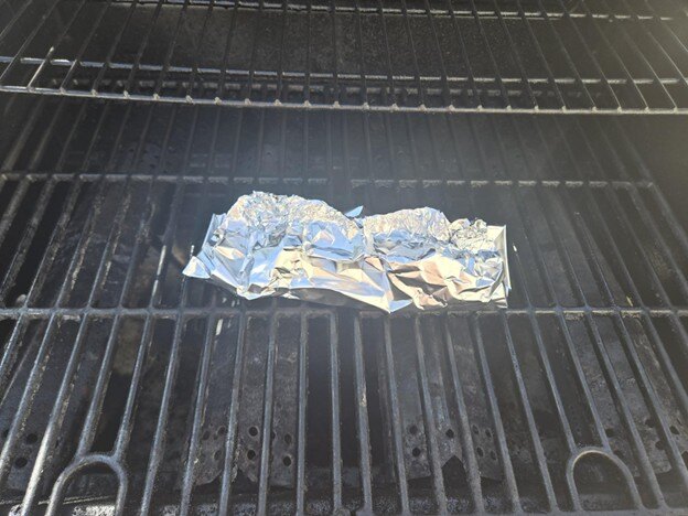 Fish packet on grill