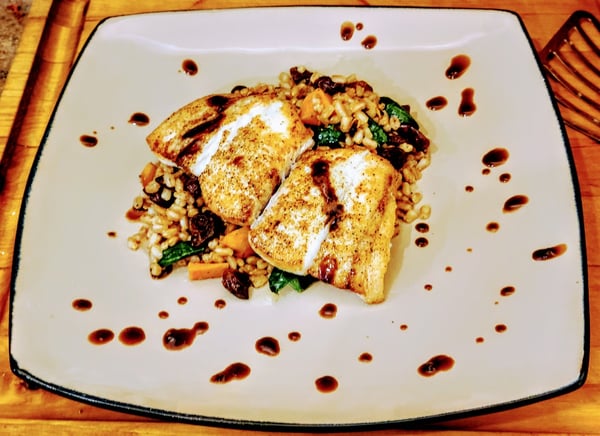 fish plated with grain bowl