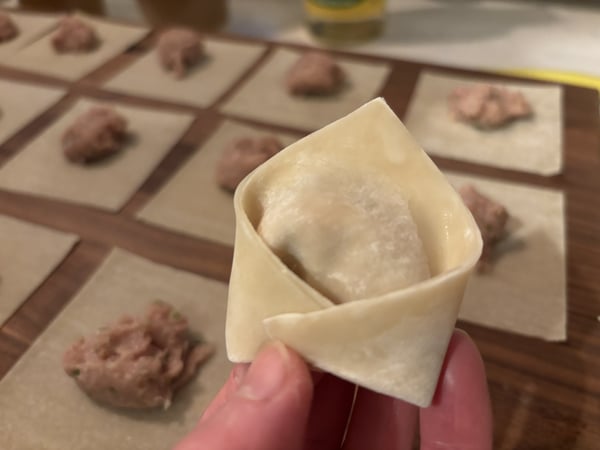 Folding wontons