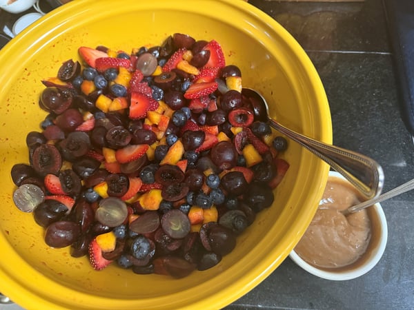 Fruit salad with peanut butter and jelly dressing
