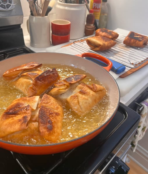 Frying second side of puffs