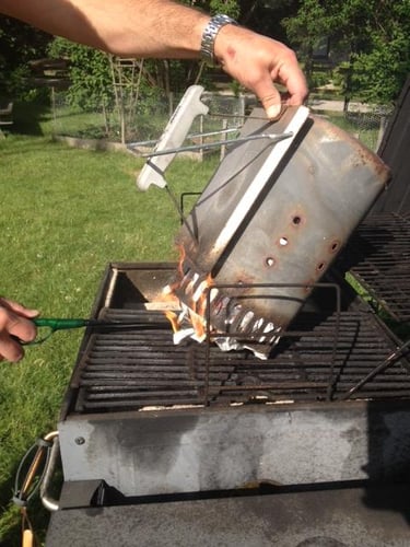 grill lit with chimney