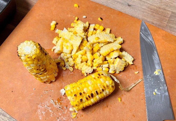 Taking kernals off cob