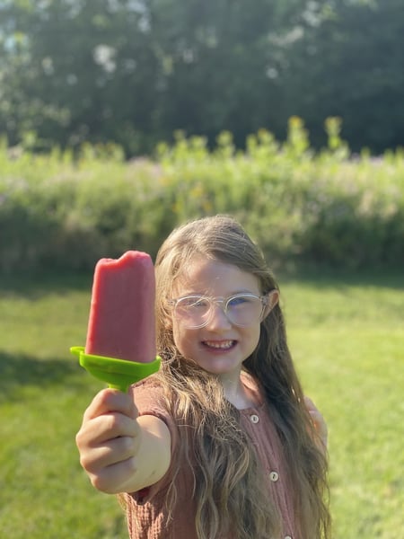 kid with popsicle