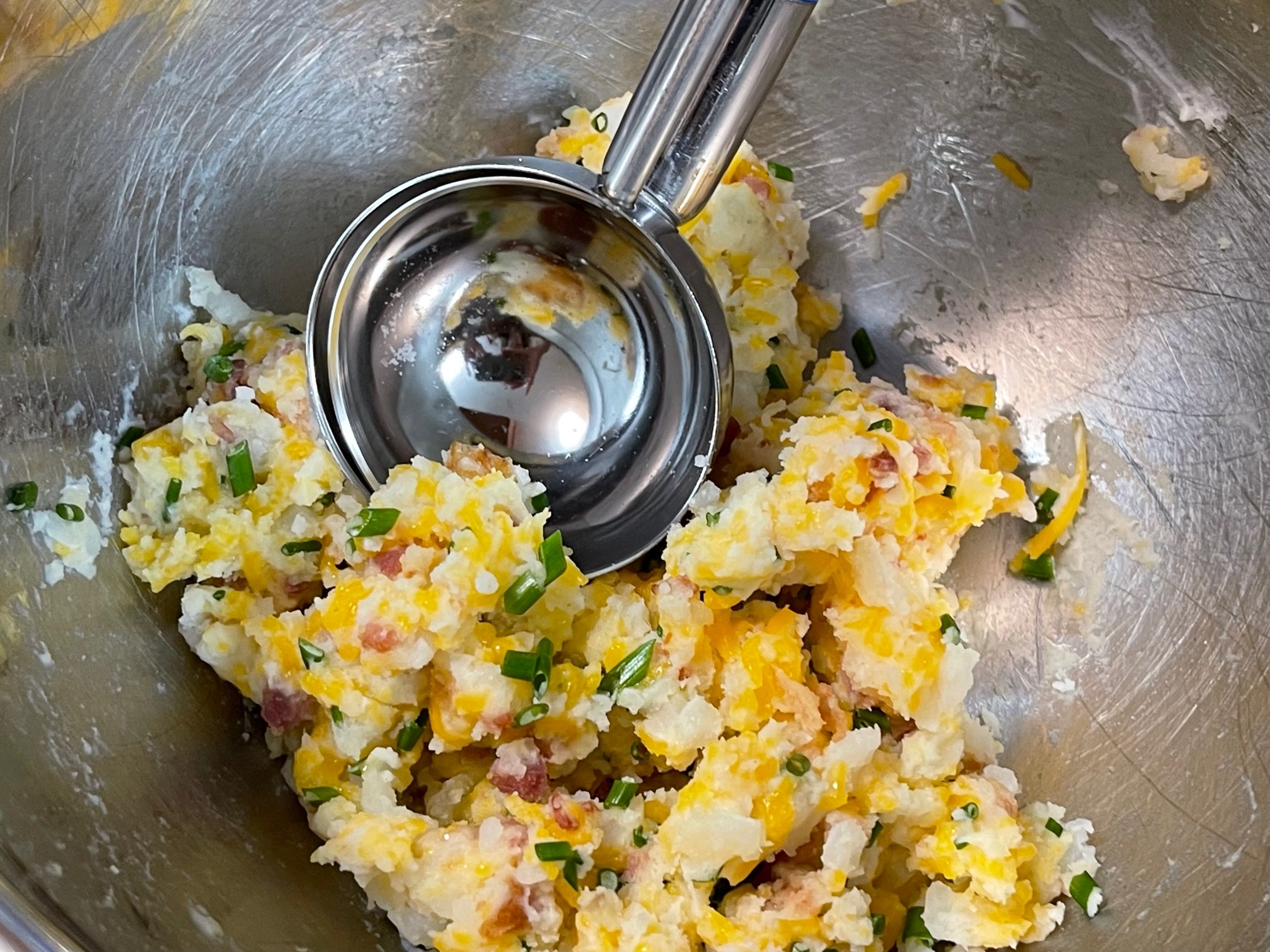 ladel in potato mixture