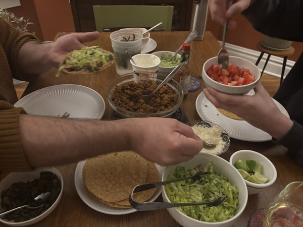 Family making tacos
